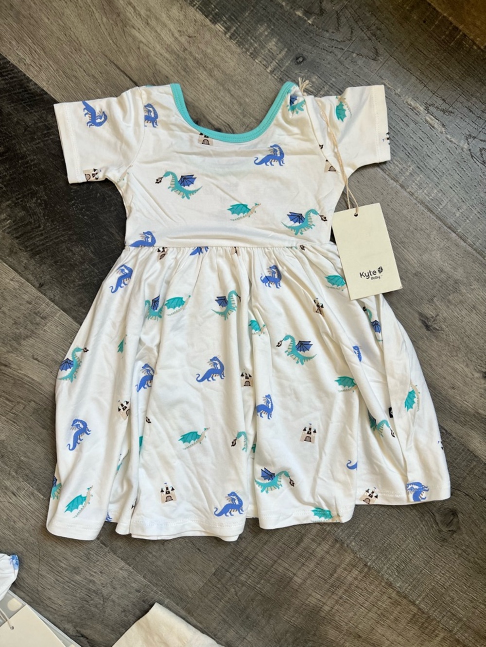 Kyte BABY White Dress with Blue and Teal Dragon Print